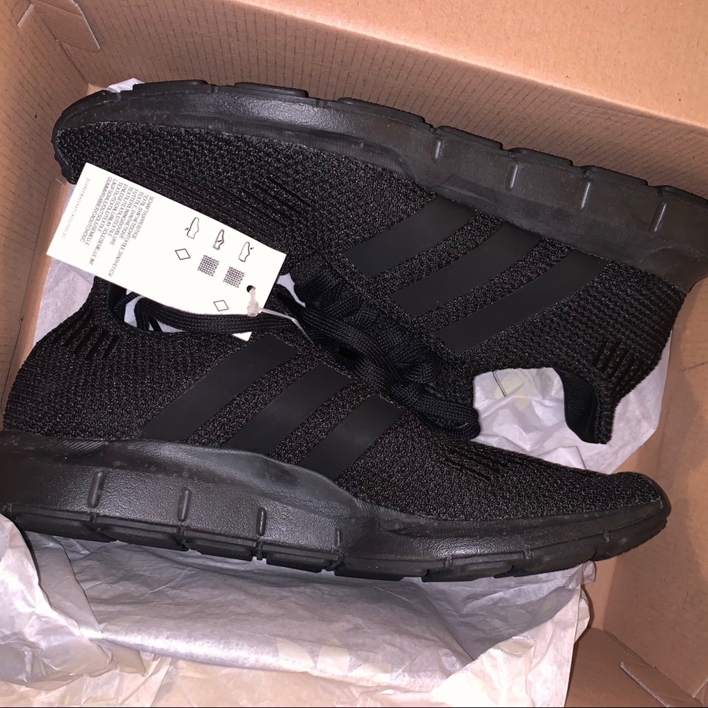 All black adidas swift run sneakers